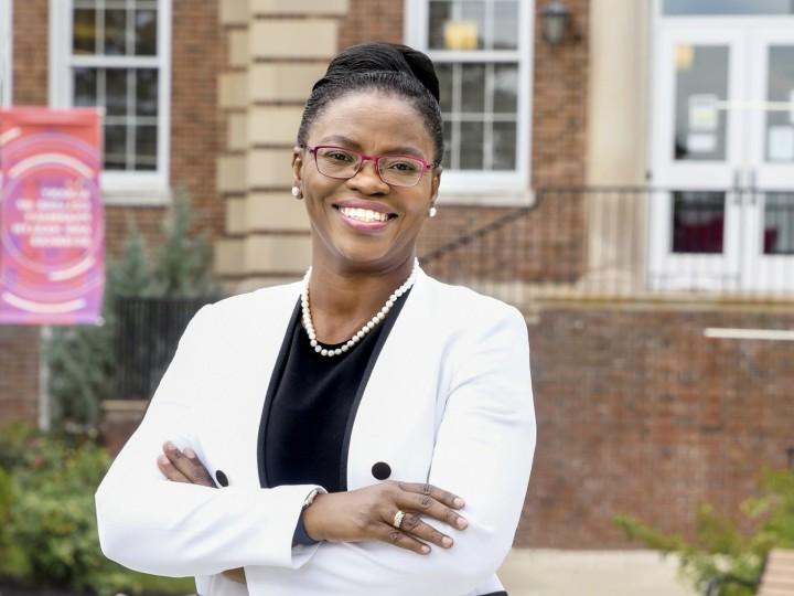 President Toyin Tofade stands on ACPHS Campus